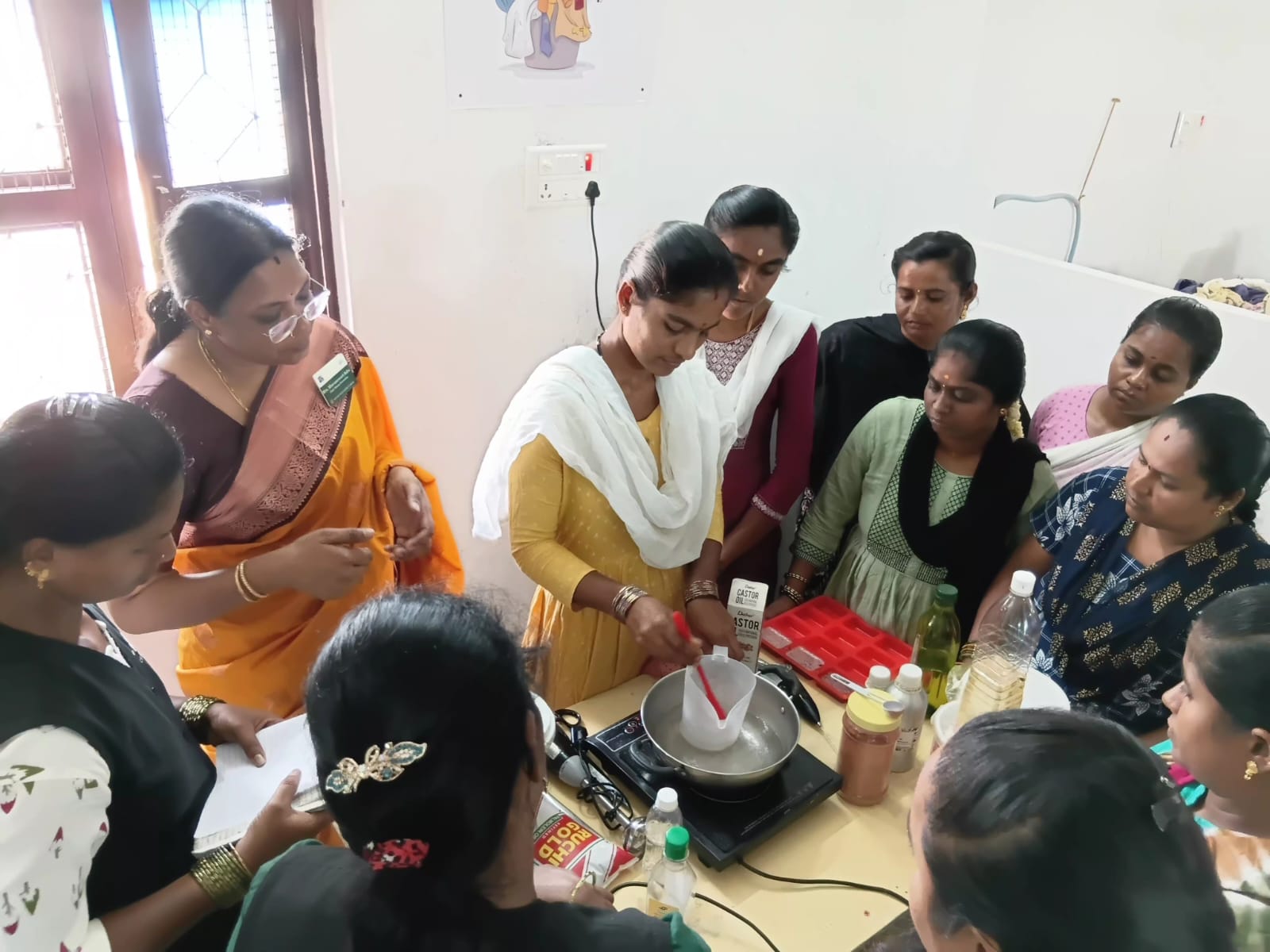 Participants taking part in a hands-on soap-making demonstration