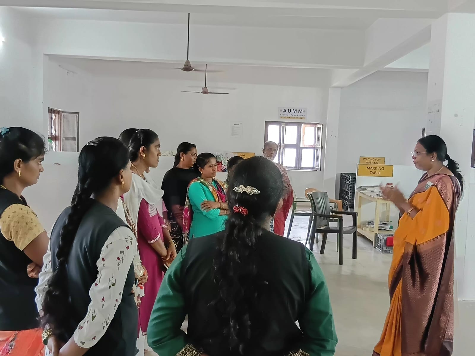 Participants listening during the soap-making class